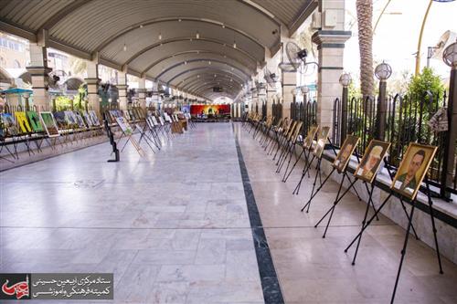 The square between Karbala's holy shrines hosts an exhibition of plastic arts to commemorate the heroism of the popular mobilization.