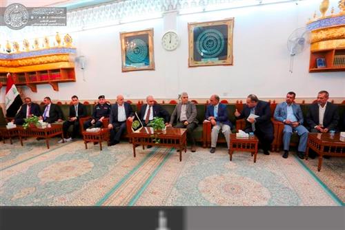 The Iraqi Planning Minister Visits the Holy Shrine of Imam Ali (PBUH).