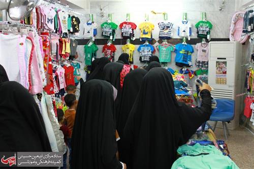 Al-'Afaf Women's Shopping Complex organizes a day for offering clothes to the orphans and families of the martyrs of the popular mobilization.